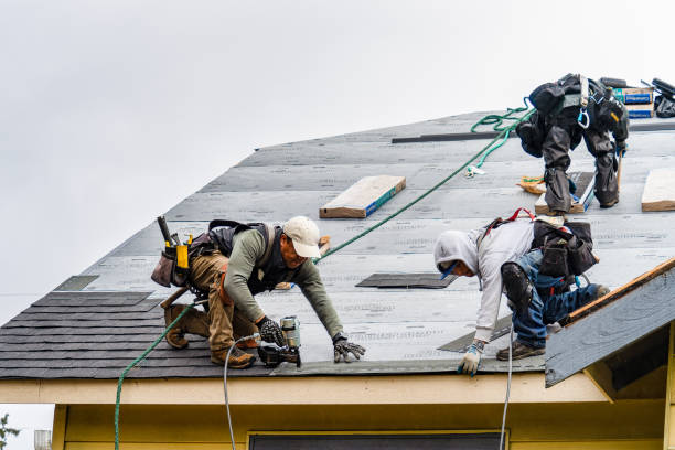 Professional Gutter Installation technician working in Cummington, MA